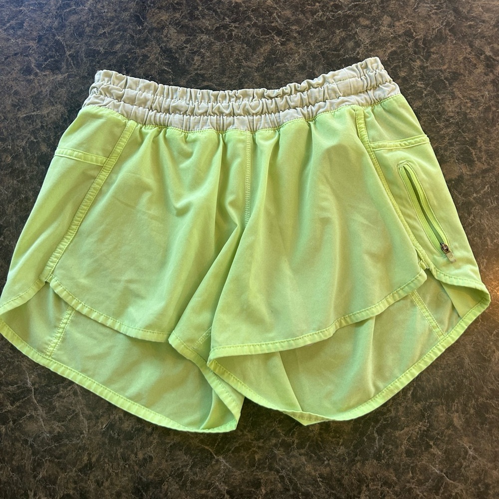 Lululemon hotter hot shorts 4 inch in a neon yellow/green